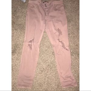 Mauve ripped jeans